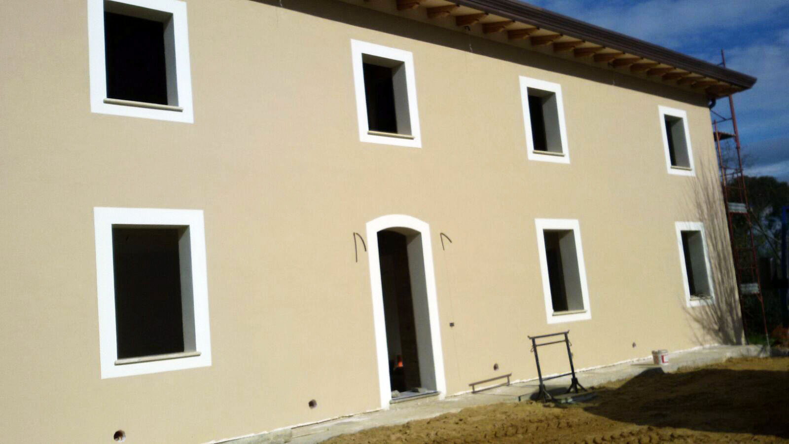 Cappotto spruzzato con intonaco colorato